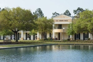 Jones Hall resting across the reflection pond